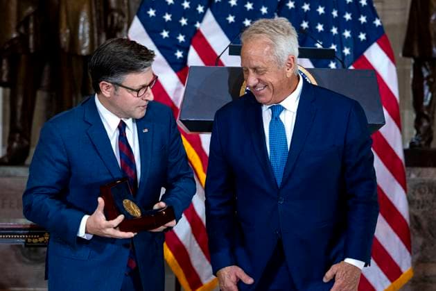 Speaker of the House Mike Johnson, R-LA, presents American cyclist Greg Lemond with the Congressional Medal of Honor during a ceremony in Statuary Hall at the U.S. Capitol in Washington, DC on Wednesday, July 9, 2025. Lemond, the first American to win the Tour de France, was awarded the medal in 2020 but the ceremony was delayed due to the COVID-19 pandemic.  WAP20250709311 BONNIExCASH