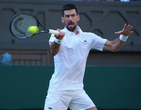 Tennis - 2025 Wimbledon Championships - Men™s singles- Quarter Final - Flavio Cobolli v Novak Djokovic All England Lawn Tennis & Croquet Club - Wednesday 9th July 2025 Novak Djokovic 