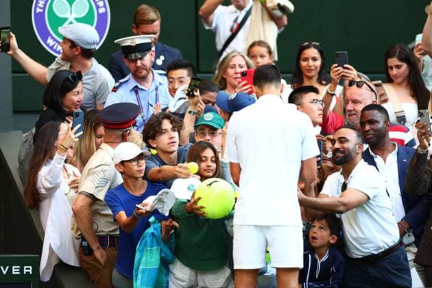 Novak Djokovic signs autographs after winning his Quarter Final match Wimbledon Tennis Championships, Day 10, The All England Lawn Tennis and Croquet Club, London, UK - 09 Jul 2025London The All England Lawn Tennis and United Kingdom  Copyright: xJamesxMarsh Shutterstockx 15389394ic