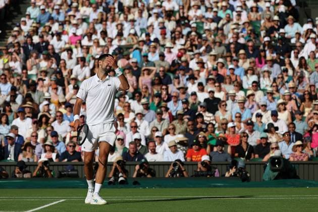 July 9, 2025, London, Celestynow, United Kingdom: NOVAK DJOKOVIC of Serbia during the match against F. Cobolli of Italy in quarter-finals of Championships 2025 at Wimbledon AELTC in London. Djokovic won 6:7 (6-8), 6:2, 7:5, 6:4 London United Kingdom - ZUMAc278 20250709_zsp_c278_064 Copyright: xMarcinxCholewinskix