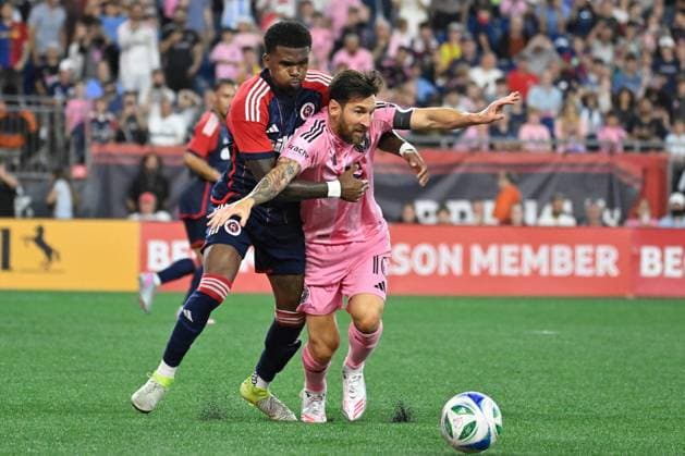 July 9, 2025; Foxborough, Massachusetts, USA; New England Revolution defender Brayan Ceballos (3) battles Inter Miami forward Lionel Messi (10) for control of the ball during the second half at Gillette Stadium. CSM Foxborough USA - ZUMAc04_ 20250709_zma_c04_095 Copyright: xEricxCanhax