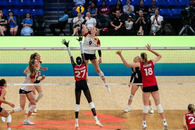 (250710) -- ARLINGTON, July 10, 2025 -- Lina Alsmeier (top) of Germany spikes the ball during the Pool 8 match between Germany and Canada at the Women s Volleyball Nations League (VNL) 2025 in Arlington, the United States, July 9, 2025. (Photo by Xinhua) (SP)U.S.-ARLINGTON-VOLLEYBALL-NATIONS LEAGUE-WOMEN-GERMANY VS CANADA ChenxChen 