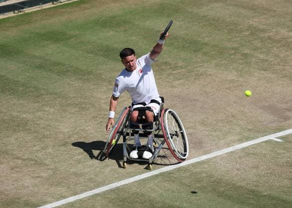 9th July 2025; All England Lawn Tennis and Croquet Club, London, England; Wimbledon Tennis Tournament, Day 10; Gordon Reid (GBR) with a backhand shot to Gustavo Fernandez (ARG) in their mens wheelchair singles quarter-final  ActionPlus12812024 JohnxPatrickxFletcher