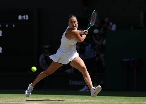 9th July 2025; All England Lawn Tennis and Croquet Club, London, England; Wimbledon Tennis Tournament, Day 10; Aryna Sabalenka (BLR) with a backhand shot to Amanda Anisimova (USA) during their Ladies Singles Semi Final  ActionPlus12812043 JohnxPatrickxFletcher