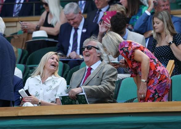 9th July 2025; All England Lawn Tennis and Croquet Club, London, England; Wimbledon Tennis Tournament, Day 10; Stephen Fry sitting in the royal box with guests during their Ladies Singles Semi Final s  ActionPlus12812059 JohnxPatrickxFletcher