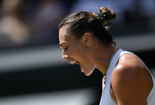 (250710) -- LONDON, July 10, 2025 -- Aryna Sabalenka reacts during the women s singles semifinal match between Aryna Sabalenka of Belarus and Amanda Anisimova of the United States at the Wimbledon Tennis Championships in London, Britain, July 10, 2025. ) (SP)BRITAIN-LONDON-TENNIS-WIMBLEDON-WOMEN S SINGLES LixYing 