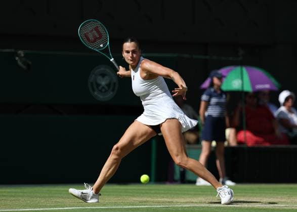 9th July 2025; All England Lawn Tennis and Croquet Club, London, England; Wimbledon Tennis Tournament, Day 10; Aryna Sabalenka (BLR) with a forehand shot to Amanda Anisimova (USA)  ActionPlus12812133 JohnxPatrickxFletcher