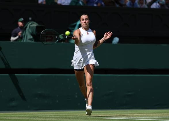 10th July 2025; All England Lawn Tennis and Croquet Club, London, England; Wimbledon Tennis Tournament, Day 11; Aryna Sabalenka (BLR) with a forehand shot to Amanda Anisimova (USA) during their womens singles semi-final match  ActionPlus12812160 JohnxPatrickxFletcher
