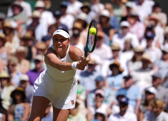 Amanda Anisimova of United States plays a shot during the Ladies Singles semi-final on day eleven of The Championships Wimbledon 2025 at All England Lawn Tennis and Croquet Club on July 10, 2025 in London, England.  Copyright: xHiroshixSatox