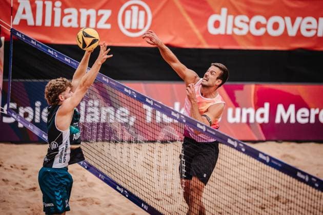 Beach volleyball men Allianz German Beach Tour 2025 Tourstop Munich 10 07 2025 right Jannis Hopt attacking against gLuis Henrichs Munich Central University Sports Munich Bavaria Germany