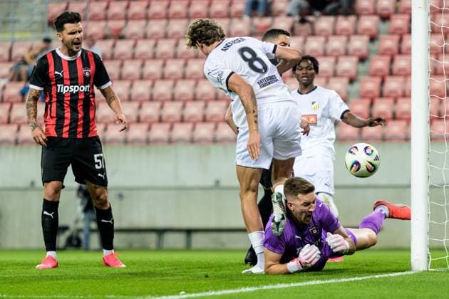 250710 Silas Andersen of Häcken and goalkeeper Ziga Frelih of Spartak Trnava during the UEFA Europa League qualifier football match between Spartak Trnava and Häcken on July 10, 2025 in Trnava Photo Mathilda Schuler BILDBYRAN kod MA MA0843 fotboll football soccer fotball uefa europa league europa league spartak trnava häcken bbeng  Copyright: MATHILDAxSCHULER BB250710MA083