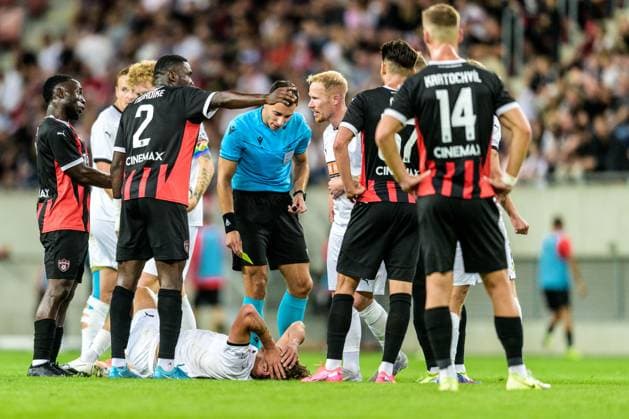 250710 Silas Andersen of Häcken and Referee Bence Csonka during the UEFA Europa League qualifier football match between Spartak Trnava and Häcken on July 10, 2025 in Trnava Photo Mathilda Schuler BILDBYRAN kod MA MA0843 fotboll football soccer fotball uefa europa league europa league spartak trnava häcken bbeng  Copyright: MATHILDAxSCHULER BB250710MA090