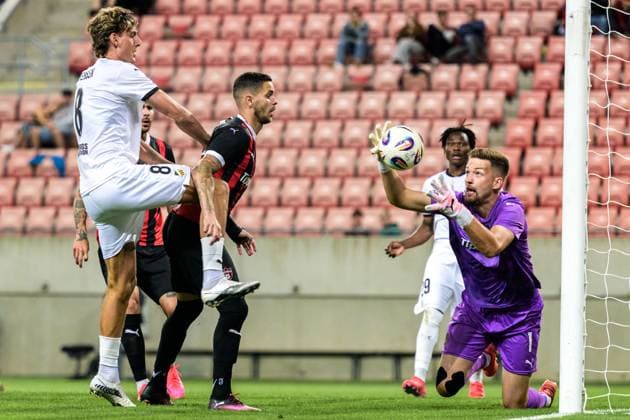 250710 Silas Andersen of Häcken and goalkeeper Ziga Frelih of Spartak Trnava during the UEFA Europa League qualifier football match between Spartak Trnava and Häcken on July 10, 2025 in Trnava Photo Mathilda Schuler BILDBYRAN kod MA MA0843 fotboll football soccer fotball uefa europa league europa league spartak trnava häcken bbeng  Copyright: MATHILDAxSCHULER BB250710MA130