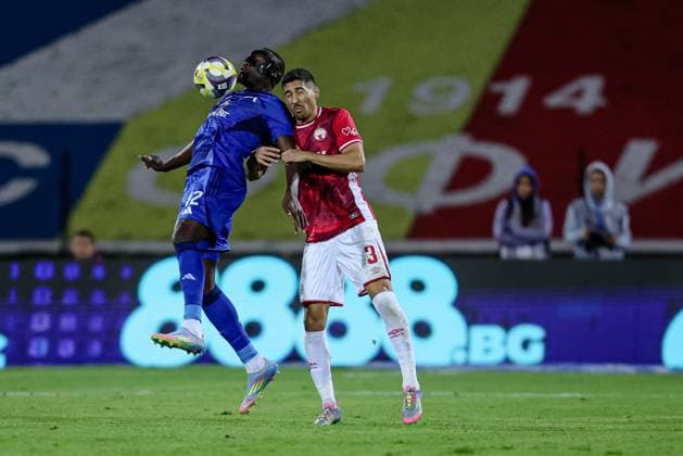 Football - UEFA Europa League - First qualifying round - Leg 1 - PFC Levski - FC Hapoel Beer Sheva - 10.07.2025 Mustapha SangarÃ of PFC Levski being challenged by Matan Baltaxa of Hapoel Beer Sheva during UEFA Europa League s first qualifying rounds 1st leg between PFC Levski and FC Hapoel Beer Sheva Bulgaria Copyright: xYulianxTodorovx
