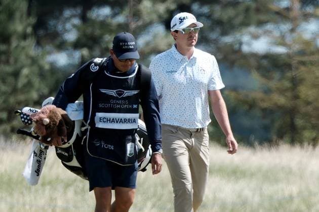 UK: The Genesis Scottish Open at The Renaissance Club, North Berwick, Scotland on 10 July 2025: Pictured: Nico Echavarria (Columbia) with his caddie Fabian Azcarate on the 18th fairway during the first round of the Genesis Scottish Open 2025 at The Renaissance Club, North Berwick, Scotland North Berwick The Renaissance Club Scotland Copyright: xAlexxToddx