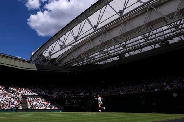 10th July 2025; All England Lawn Tennis and Croquet Club, London, England; Wimbledon Tennis Tournament, Day 11; A packed Centre Court as Aryna Sabalenka (BLR) hits a forehand shot to Amanda Anisimova (USA) in their ladies singles semi-final  ActionPlus12812234 JohnxPatrickxFletcher