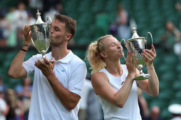 10th July 2025; All England Lawn Tennis and Croquet Club, London, England; Wimbledon Tennis Tournament, Day 11; Sem Verbeek (NED) and Katerina Siniakova (CZE) kissing the Mixed Doubles Trophy after defeating Joe Salisbury (GBR) and Luisa Stefani (BRA) in straight sets  ActionPlus12812235 JohnxPatrickxFletcher