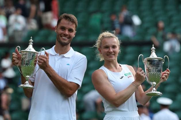 10th July 2025; All England Lawn Tennis and Croquet Club, London, England; Wimbledon Tennis Tournament, Day 11; Sem Verbeek (NED) and Katerina Siniakova (CZE) pose with the Mixed Doubles Trophy after defeating Joe Salisbury (GBR) and Luisa Stefani (BRA) in straight sets  ActionPlus12812236 JohnxPatrickxFletcher