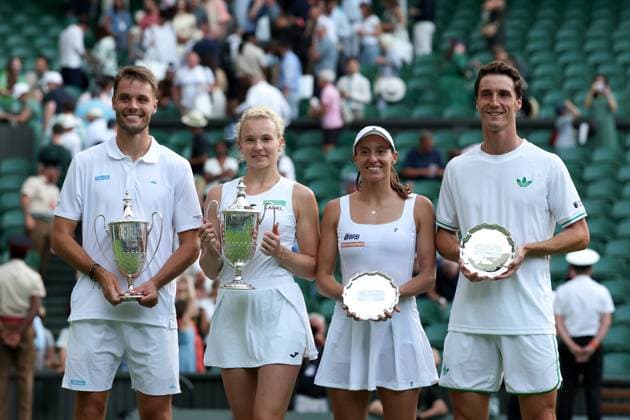 10th July 2025; All England Lawn Tennis and Croquet Club, London, England; Wimbledon Tennis Tournament, Day 11; Sem Verbeek (NED) and Katerina Siniakova (CZE) kissing the Mixed Doubles Trophy alongside runners up Joe Salisbury (GBR) and Luisa Stefani (BRA)  ActionPlus12812237 JohnxPatrickxFletcher
