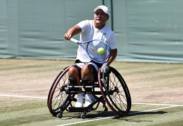 LONDON, ENGLAND - JULY 11: Li Xiaohui of China competes against Yui Kamiji of Japan during the Ladies Wheelchair Singles Semifinal match on day twelve of 2025 Wimbledon Championships at All England Lawn Tennis and Croquet Club on July 11, 2025 in London, England.  Copyright: xVCGx 111579025938