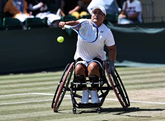 LONDON, ENGLAND - JULY 11: Li Xiaohui of China competes against Yui Kamiji of Japan during the Ladies Wheelchair Singles Semifinal match on day twelve of 2025 Wimbledon Championships at All England Lawn Tennis and Croquet Club on July 11, 2025 in London, England.  Copyright: xVCGx 111579025939