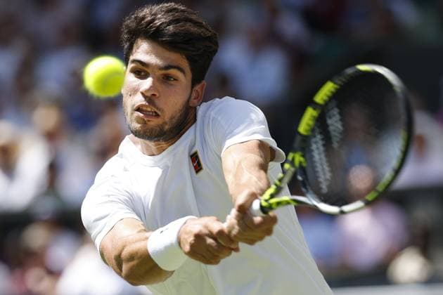Tennis: Wimbledon championships Carlos Alcaraz of Spain plays against Taylor Fritz of the United States in the men s singles semifinals at the Wimbledon tennis tournament in London on July 11, 2025.  A14AA0004718567P