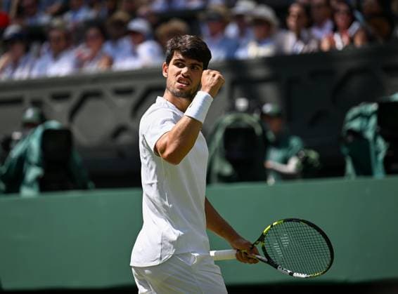 (250711) -- LONDON, July 11, 2025 -- Carlos Alcaraz celebrates during the men s singles semifinal match between Carlos Alcaraz of Spain and Taylor Fritz of the United States at the Wimbledon Tennis Championships in London, Britain, July 11, 2025. ) (SP)BRITAIN-LONDON-TENNIS-WIMBLEDON-MEN S SINGLES ZhaoxDingzhe 