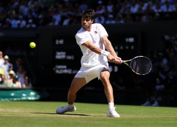 Wimbledon Championships 2025 AELTC, Day Twelve, London, UK - 11 07 2025 Carlos Alcaraz (ESP) in action during his Semi final match against Taylor Fritz (USA) in the 2025 Wimbledon Championships London Wimbledon London GBR, UK NEWSPAPERS OUT Copyright: xMarkxGreenwoodx