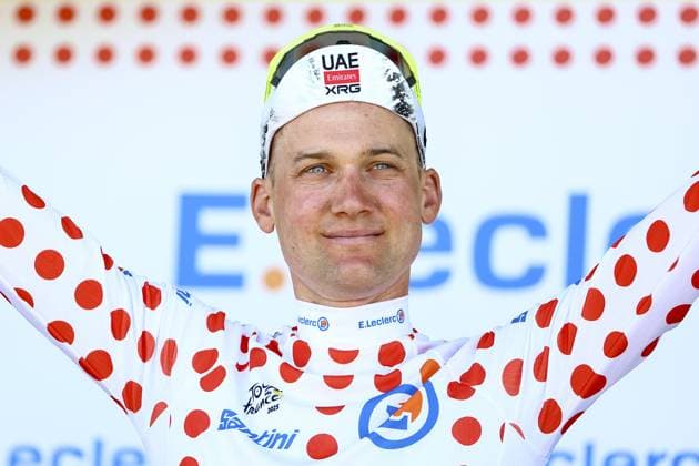 Belgian Tim Wellens of UAE Team Emirates celebrates on the podium in the red polka-dot jersey for best climber after stage seven of the 2025 Tour de France cycling, from Saint-Malo to Mur-de-Bretagne (194 km), on Friday 11 July 2025 in France. The 112th edition of the Tour de France starts on Saturday 5 July in Lille, France, and will finish in Paris, France on the 27th of July. DAVIDxPINTENS  x128906510x