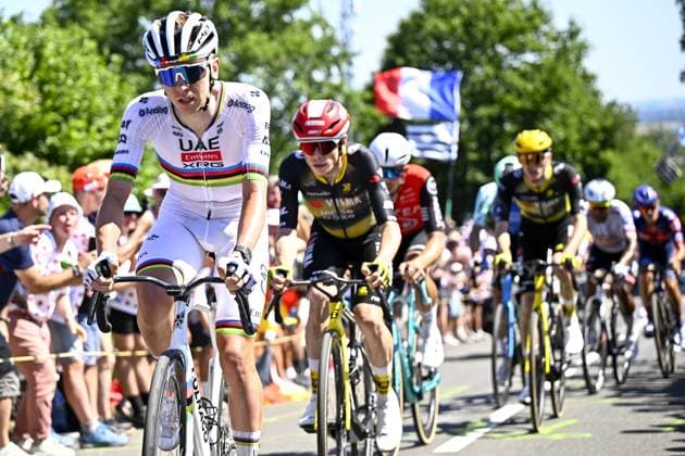 Slovenian Tadej Pogacar of UAE Team Emirates and Danish Jonas Vingegaard Hansen of Team Visma-Lease a Bike pictured in action during stage seven of the 2025 Tour de France cycling, from Saint-Malo to Mur-de-Bretagne (194 km), on Friday 11 July 2025 in France. The 112th edition of the Tour de France starts on Saturday 5 July in Lille, France, and will finish in Paris, France on the 27th of July. DAVIDxPINTENS  x128907002x