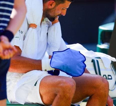 Novak Djokovic with an ice-pack on his hand during his semi final match Wimbledon Tennis Championships, Day 12, The All England Lawn Tennis and Croquet Club, London, UK - 11 Jul 2025London The All England Lawn Tennis and United Kingdom  Copyright: xJavierxGarcia Shutterstockx 15392287bi