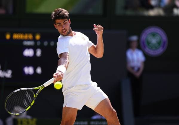 Carlos Alcaraz of Spain plays a shot during the Men s Singles Semifinal match on day twelve of The Championships Wimbledon 2025 at All England Lawn Tennis and Croquet Club on July 11, 2025 in London, England.  Copyright: xHiroshixSatox