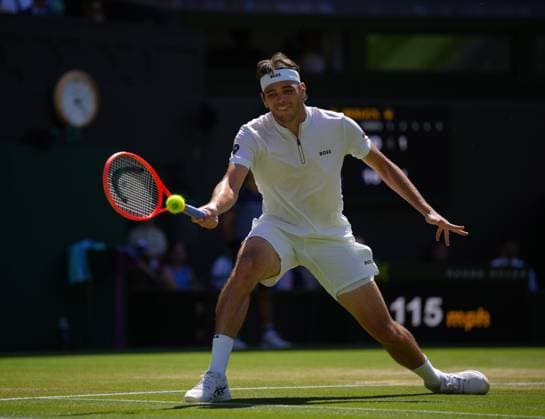 Taylor Fritz of the United States of America plays a shot during the Men s Singles Semifinal match on day twelve of The Championships Wimbledon 2025 at All England Lawn Tennis and Croquet Club on July 11, 2025 in London, England.  Copyright: xHiroshixSatox