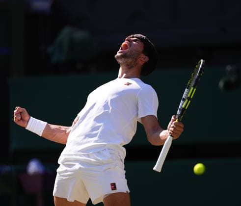 Carlos Alcaraz of Spain celebrates after winning the Men s Singles Semifinal match on day twelve of The Championships Wimbledon 2025 at All England Lawn Tennis and Croquet Club on July 11, 2025 in London, England.  Copyright: xHiroshixSatox