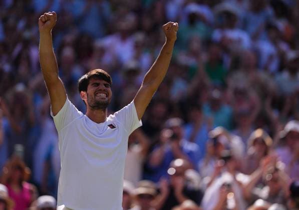 Carlos Alcaraz of Spain celebrates after winning the Men s Singles Semifinal match on day twelve of The Championships Wimbledon 2025 at All England Lawn Tennis and Croquet Club on July 11, 2025 in London, England.  Copyright: xHiroshixSatox