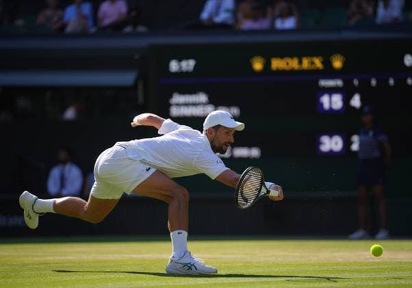 Novak Djokovic of Serbia plays a shot during the Gentlemen s Singles semi-final match on day twelve of The Championships Wimbledon 2025 at All England Lawn Tennis and Croquet Club on July 11, 2025 in London, England.  Copyright: xHiroshixSatox