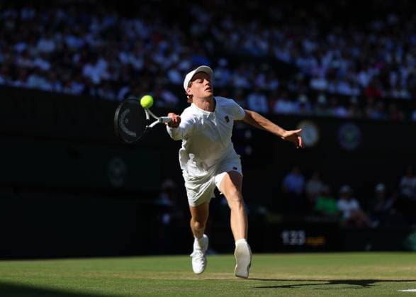 11th July 2025; All England Lawn Tennis and Croquet Club, London, England; Wimbledon Tennis Tournament, Day 12; Jannik Sinner (ITA) with a forehand shot to Novak Djokovic (SRB) mens singles semi-final  ActionPlus12812429 JohnxPatrickxFletcher