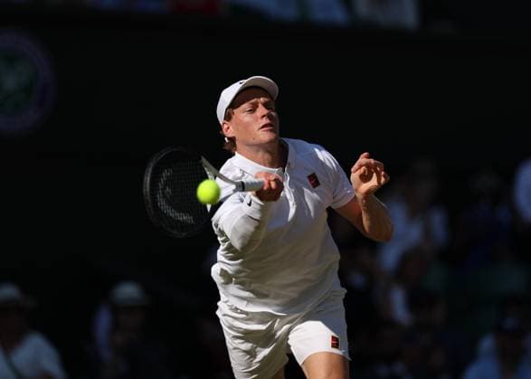 11th July 2025; All England Lawn Tennis and Croquet Club, London, England; Wimbledon Tennis Tournament, Day 12; Jannik Sinner (ITA) with a forehand shot to Novak Djokovic (SRB) mens singles semi-final  ActionPlus12812431 JohnxPatrickxFletcher
