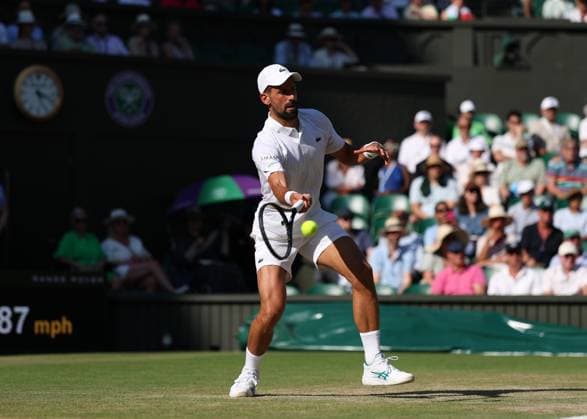 11th July 2025; All England Lawn Tennis and Croquet Club, London, England; Wimbledon Tennis Tournament, Day 12; Novak Djokovic (SRB) with a forehand shot to Jannik Sinner (ITA) mens singles semi-final  ActionPlus12812439 JohnxPatrickxFletcher