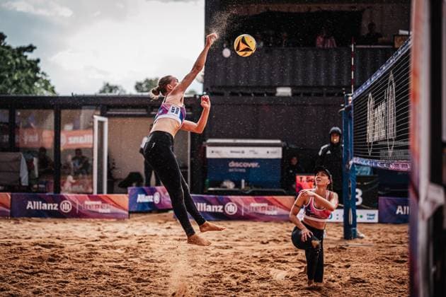 Beach volleyball women Allianz German Beach Tour 2025 Tourstop Munich 11 07 2025 Tabea Schwarz attacking in the rain Munich Central University Sports Munich Bavaria Germany