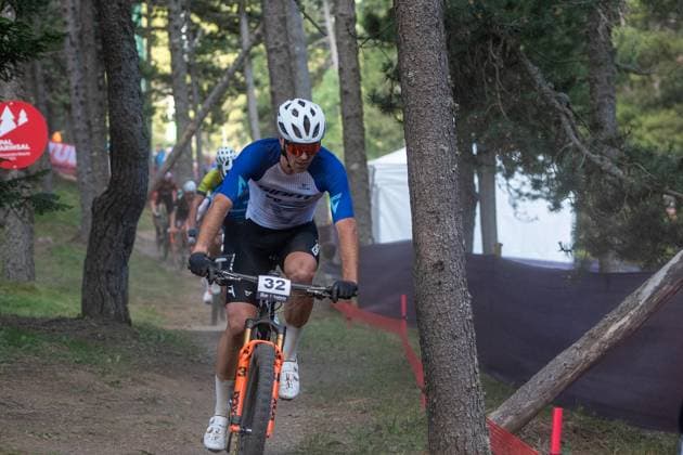 UCI Mountain Bike World Cup 2025 In Pal Arinsal, Andorra, on July 11, 2025, Carter Woods from Canada, representing the Giant Factory Off-Road Team - XC, competes in the CROSS-COUNTRY SHORT TRACK Men Elite during the UCI Mountain Bike World Cup Andorra 2025. Pal Andorra  Copyright: xMartinxSilvaxCosentinox originalFilename:silvacosentino-carterwo250711_npx4G.jpg