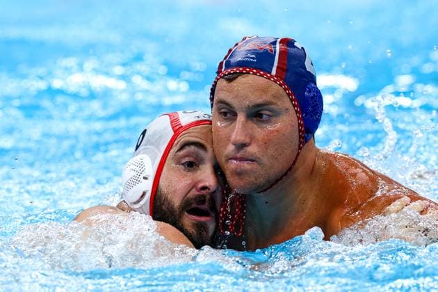 David Lapins of Canada, Jack Larsen of USA Canada v United States, Water polo, Wasserball Singapore 2025 World Aquatics Championships, OCBC Aquatic Centre, July 12, 2025, Singapore, Singapore.