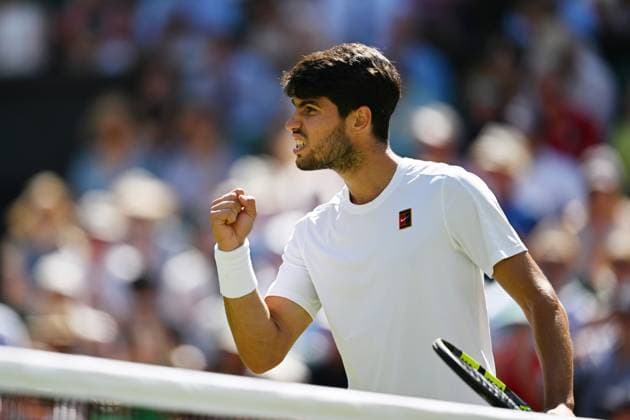 (250712) -- LONDON, July 12, 2025 -- Carlos Alcaraz celebrates scoring during the men s singles semifinal match between Carlos Alcaraz of Spain and Taylor Fritz of the United States at the Wimbledon Tennis Championships in London, Britain, July 11, 2025. ) (SP)BRITAIN-LONDON-TENNIS-WIMBLEDON-MEN S SINGLES ZhaoxDingzhe 