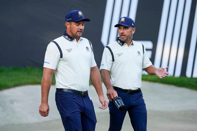 July 12, 2025, Cadiz, Cadiz, SPAIN: Bryson Dechambeau of Crushers team and Paul Casey of Crushers team gesture during day one resume game for weather yesterday of the LIV Golf Andalucia at Golf Club Royal of Valderrama on July 12, 2025 in Cadiz, Spain. Cadiz SPAIN - ZUMAa181 20250712_zaa_a181_022 Copyright: xJoaquinxCorcherox