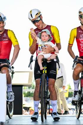 Tour de France 2025 Stage 8 LAVAL ESPACE MAYENNE, FRANCE - JULY 12 : Touze Damien (FRA) of Cofidis with his baby on stage before the start of the race during stage 8 of the 112th edition of Tour de France an UCI World Tour 2.UWT cycling road race stage for Men Elite of 174 km with start in Saint-Meen-le-Grand and finish in Laval Espace Mayenne on July 12, 2025 in Laval Espace Mayenne, France, 12 07 2025 ( Motordriver Kenny Verfaillie - Laval Espace Mayenne France  Copyright: xJanxDexMeuleneirx