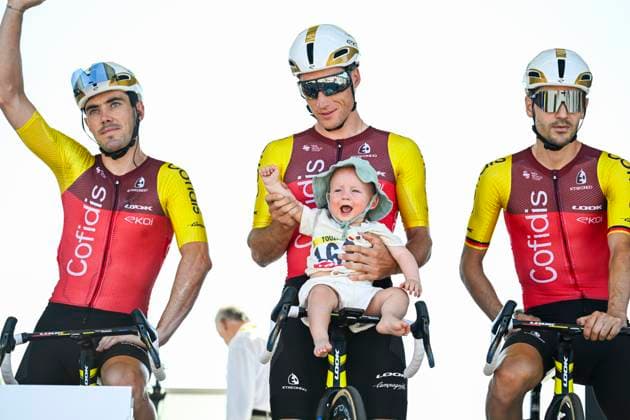 Tour de France 2025 Stage 8 LAVAL ESPACE MAYENNE, FRANCE - JULY 12 : Touze Damien (FRA) of Cofidis with his baby on stage before the start of the race during stage 8 of the 112th edition of Tour de France an UCI World Tour 2.UWT cycling road race stage for Men Elite of 174 km with start in Saint-Meen-le-Grand and finish in Laval Espace Mayenne on July 12, 2025 in Laval Espace Mayenne, France, 12 07 2025 ( Motordriver Kenny Verfaillie - Laval Espace Mayenne France  Copyright: xJanxDexMeuleneirx