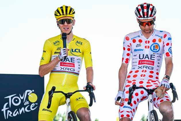 Tour de France 2025 Stage 8 LAVAL ESPACE MAYENNE, FRANCE - JULY 12 : Pogacar Tadej (SLO) of UAE Team Emirates - XRG and Wellens Tim (BEL) of UAE Team Emirates - XRG on stage before the start of the race during stage 8 of the 112th edition of Tour de France an UCI World Tour 2.UWT cycling road race stage for Men Elite of 174 km with start in Saint-Meen-le-Grand and finish in Laval Espace Mayenne on July 12, 2025 in Laval Espace Mayenne, France, 12 07 2025 ( Motordriver Kenny Verfaillie - Laval Espace Mayenne France  Copyright: xJanxDexMeuleneirx