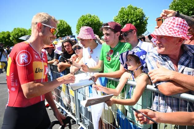 Tour de France 2025 Stage 8 LAVAL ESPACE MAYENNE, FRANCE - JULY 12 : Cort Magnus (DEN) of Uno-X Mobility with fans before the start of the race during stage 8 of the 112th edition of Tour de France an UCI World Tour 2.UWT cycling road race stage for Men Elite of 174 km with start in Saint-Meen-le-Grand and finish in Laval Espace Mayenne on July 12, 2025 in Laval Espace Mayenne, France, 12 07 2025 ( Motordriver Kenny Verfaillie - Laval Espace Mayenne France  Copyright: xVincentxKalutx