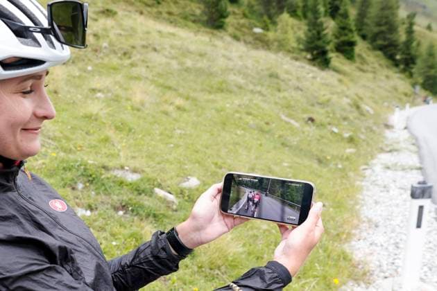 CYCLING - Tour of Austria 2025 KUEHTAI,AUSTRIA,12.JUL.25 - CYCLING - Tour of Austria, stage 3, Innsbruck - Kuehtai. Image shows a feature with a phone.  GEPAxpictures xMichaelxKristen