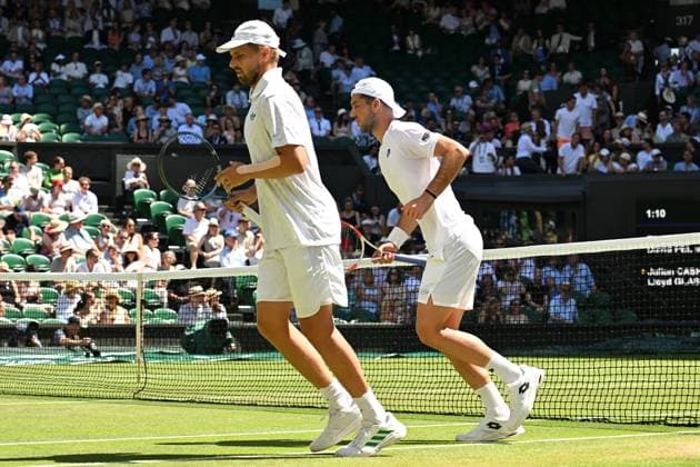 Wimbledon Tennis Championships - Day 13 LONDON, UNITED KINGDOM - JULY 12: Julian Cash and Lloyd Glasspool of United Kingdom in action against Rinky Hijikata of Australia and David Pel of the Netherlands during Championships Wimbledon 2025 Men’s Doubles final tennis match at All England Lawn Tennis and Croquet Club in London, United Kingdom on July 12, 2025. Ray Tang Anadolu London United Kingdom. Editorial use only. Please get in touch for any other usage.  Copyright: x2025xAnadoluxRayxTangx